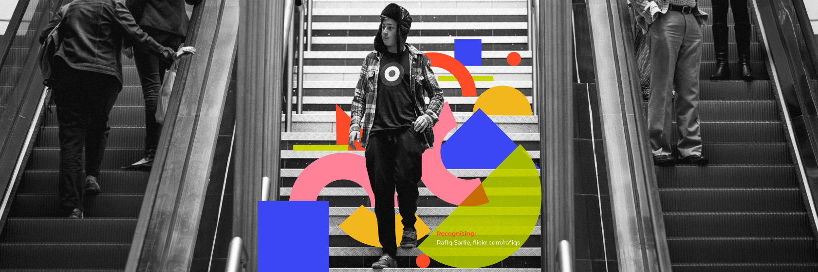 People walking down and up stairs