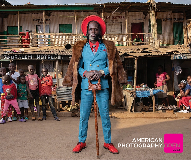 A notable winner in photography was Mauro De Bettio, the grand prize winner of AI-AP’s American Photography Open 2022 competition (powered by Award Force) for his photograph named “Gentlemen of Kiberia” – an image of a sprucely dressed model, named Baqteria, in Kiberia, the largest slum in Nairobi.